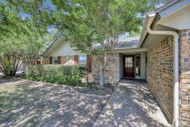 320 Gloria St, Keller, TX 76248 - view of exterior entry with brick siding and roof with shingles