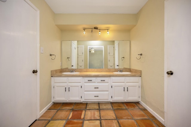320 Gloria St, Keller, TX 76248 - full bathroom featuring double vanity, baseboards, and tile patterned floors