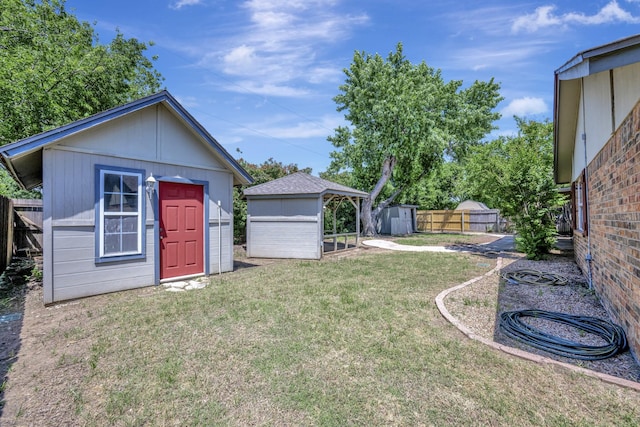 320 Gloria St, Keller, TX 76248 - view of yard with a storage unit and an outbuilding