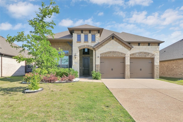 2917 Bobcat Dr, Melissa, TX 75454 - french provincial home with driveway, an attached garage, a front lawn, stone siding, and roof with shingles