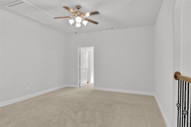 2917 Bobcat Dr, Melissa, TX 75454 - empty room with attic access, a ceiling fan, light carpet, and baseboards