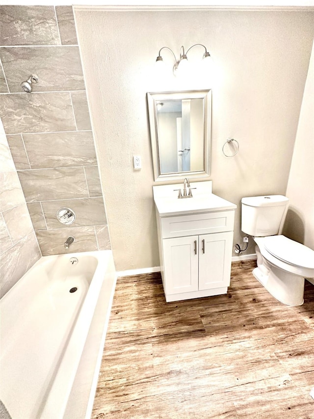 177 Catfish Trl, Whitney, TX 76692 - full bath with toilet, wood finished floors, vanity, and baseboards