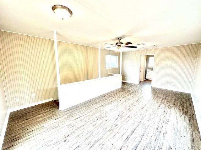 177 Catfish Trl, Whitney, TX 76692 - spare room featuring ceiling fan, wood finished floors, and baseboards
