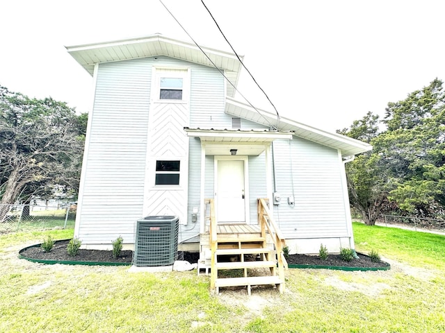 177 Catfish Trl, Whitney, TX 76692 - rear view of property featuring cooling unit and a wooden deck