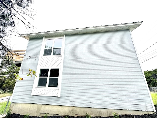 177 Catfish Trl, Whitney, TX 76692 - view of home's exterior with metal roof