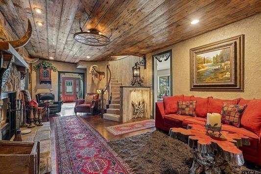1847 N State Highway 19, Emory, TX 75440 - living room featuring wood ceiling, stairs, recessed lighting, and wood finished floors