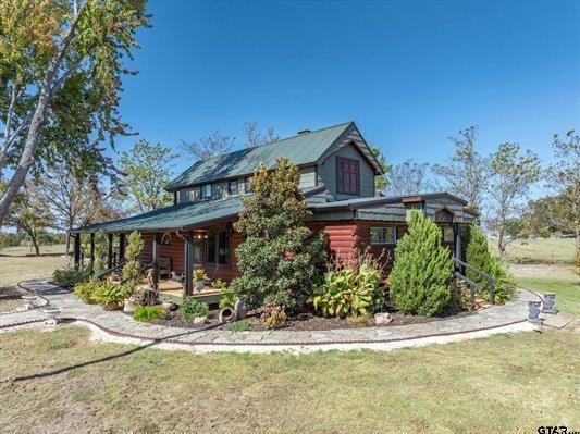 1847 N State Highway 19, Emory, TX 75440 - view of front facade featuring a porch and a front lawn