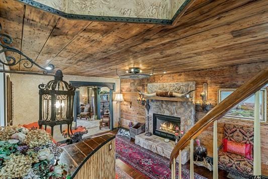 1847 N State Highway 19, Emory, TX 75440 - living area with a fireplace, wood finished floors, and wooden ceiling