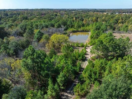 1847 N State Highway 19, Emory, TX 75440 - aerial view of property and surrounding area featuring a heavily wooded area and a nearby body of water