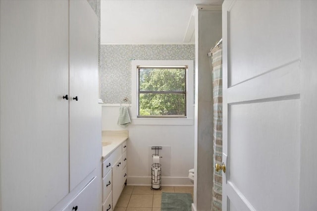 13591 County Road 420, Tyler, TX 75704 - full bath featuring tile patterned flooring, vanity, and baseboards