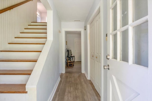 13591 County Road 420, Tyler, TX 75704 - hall with wood finished floors, stairway, and baseboards