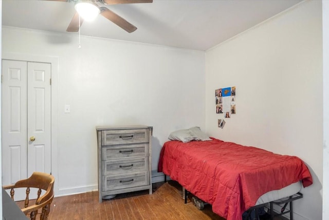 13591 County Road 420, Tyler, TX 75704 - bedroom featuring wood finished floors, crown molding, baseboards, and a ceiling fan