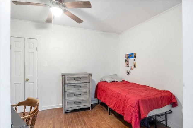 13591 County Road 420, Tyler, TX 75704 - bedroom featuring wood finished floors, ornamental molding, baseboards, and ceiling fan