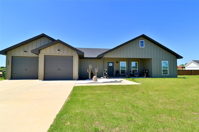 130 County Road 2630, Decatur, TX 76234 - view of front of house featuring an attached garage, board and batten siding, and concrete driveway