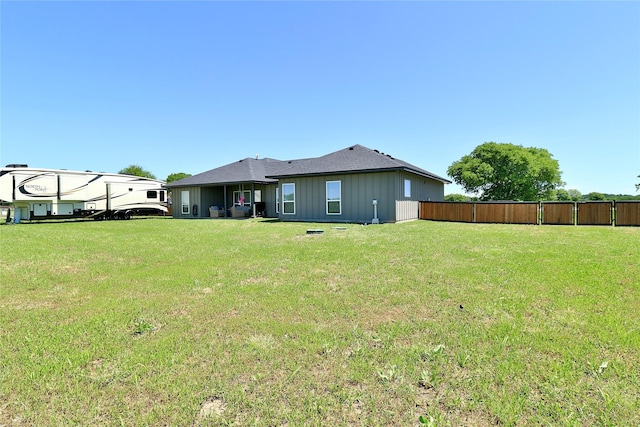 130 County Road 2630, Decatur, TX 76234 - back of property featuring board and batten siding