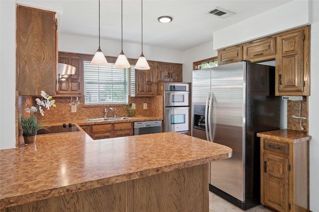 1706 Morningstar Trl, Richardson, TX 75081 - kitchen with a sink, stainless steel appliances, healthy amount of natural light, and tasteful backsplash