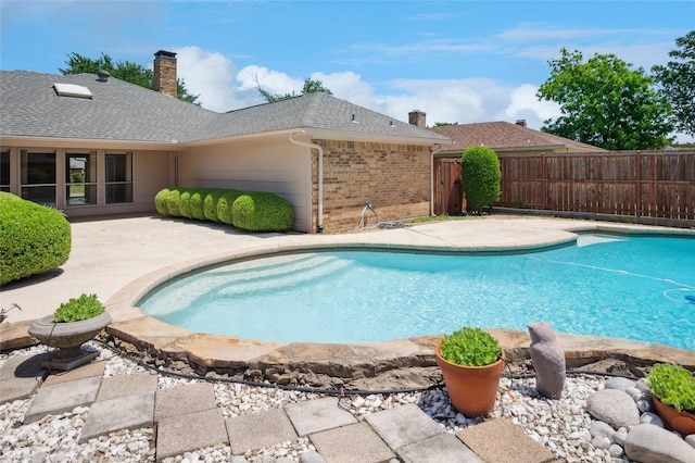 1706 Morningstar Trl, Richardson, TX 75081 - view of swimming pool featuring fence and a patio