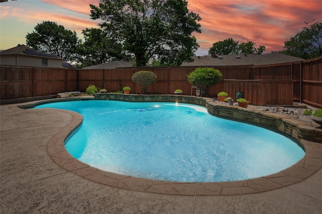 1706 Morningstar Trl, Richardson, TX 75081 - pool at dusk with a fenced backyard