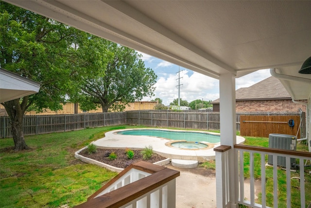 2513 First St, Caddo Mills, TX 75135 - view of pool with central air condition unit, a patio area, and a pool with connected hot tub