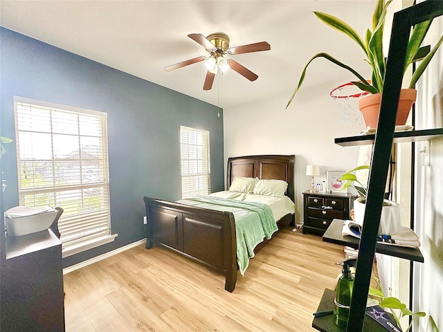 6468 Payton Dr, Fort Worth, TX 76131 - bedroom with light wood-type flooring and ceiling fan