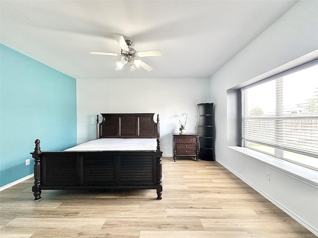 6468 Payton Dr, Fort Worth, TX 76131 - bedroom with light wood-style flooring, baseboards, and ceiling fan