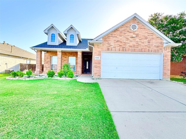 6468 Payton Dr, Fort Worth, TX 76131 - view of front of property featuring brick siding, driveway, and an attached garage