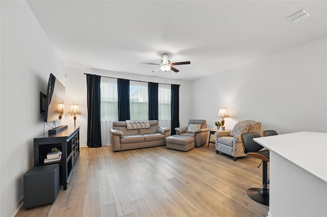 832 Garner Dr, Fate, TX 75087 - living room with a ceiling fan and light wood-style flooring