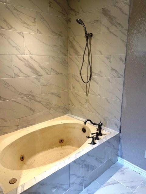 426 Gun Club Rd, Denison, TX 75021 - bathroom featuring marble finish flooring and washtub / shower combination