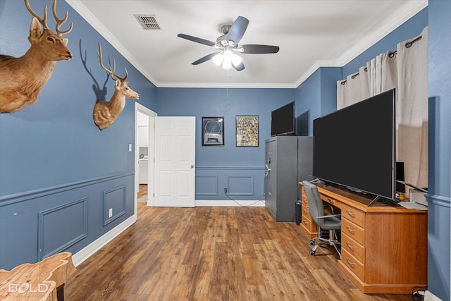 4013 Wisteria Ln, Benton, LA 71006 - office space with ceiling fan, wood finished floors, crown molding, a decorative wall, and wainscoting