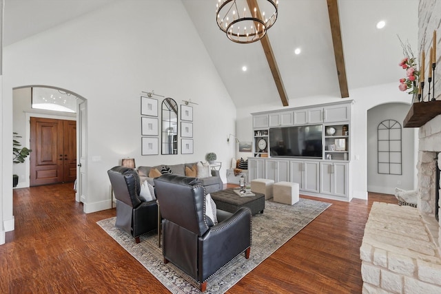 1316 Sparrow Hawk Ln, Gunter, TX 75058 - living area featuring arched walkways, high vaulted ceiling, a chandelier, wood finished floors, and recessed lighting