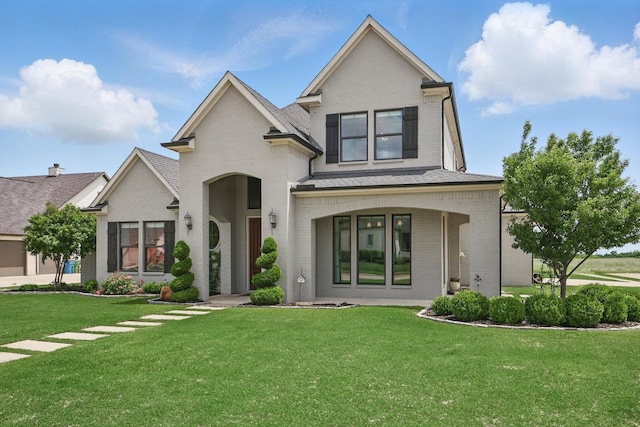 1316 Sparrow Hawk Ln, Gunter, TX 75058 - view of front of home featuring a front yard and brick siding