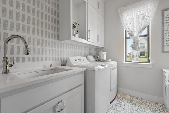 1316 Sparrow Hawk Ln, Gunter, TX 75058 - washroom featuring independent washer and dryer, cabinet space, and baseboards