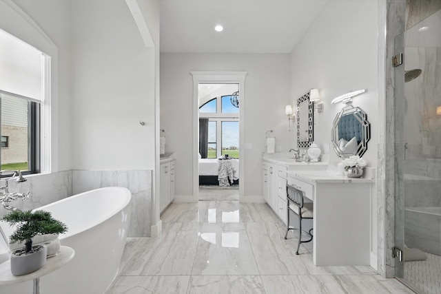 1316 Sparrow Hawk Ln, Gunter, TX 75058 - bathroom featuring a marble finish shower, ensuite bath, marble finish flooring, vanity, and recessed lighting