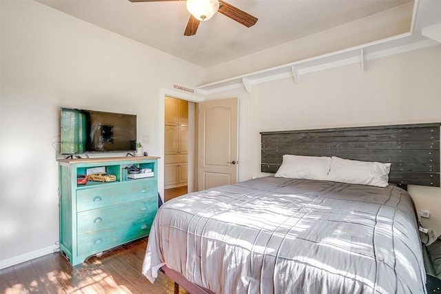 1201 W Buffalo Trl, Joshua, TX 76058 - bedroom featuring wood finished floors, a ceiling fan, and baseboards