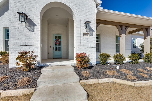 2228 Sandrellan St, Fort Worth, TX 76008 - doorway to property with brick siding and covered porch