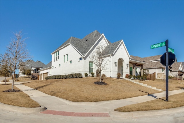 2228 Sandrellan St, Fort Worth, TX 76008 - view of front facade featuring brick siding