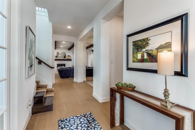 2228 Sandrellan St, Fort Worth, TX 76008 - hall featuring light wood-style floors, baseboards, and stairs