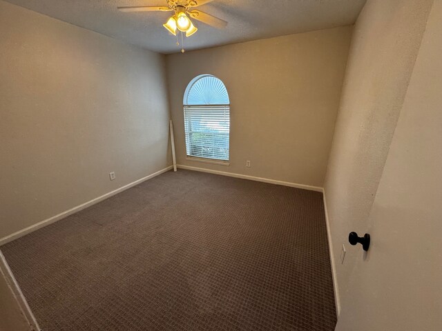 2910 Raintree Dr, Plano, TX 75074 - unfurnished room featuring ceiling fan, baseboards, and carpet floors
