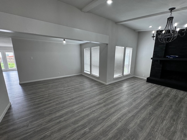 2910 Raintree Dr, Plano, TX 75074 - unfurnished living room featuring a chandelier, beam ceiling, baseboards, dark wood-style floors, and recessed lighting