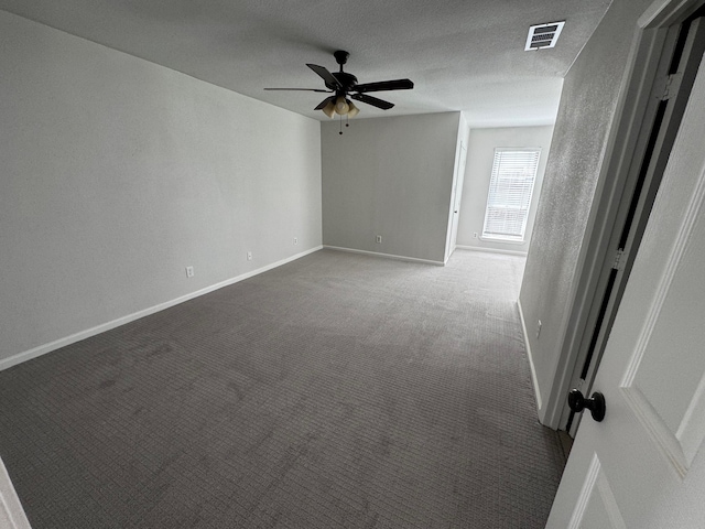 2910 Raintree Dr, Plano, TX 75074 - empty room with a ceiling fan, baseboards, and carpet flooring
