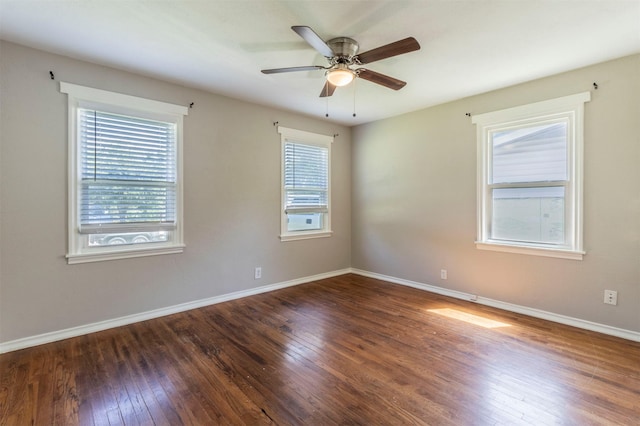 1610 Florence St, Arlington, TX 76010 - unfurnished room featuring hardwood / wood-style floors, a ceiling fan, and baseboards