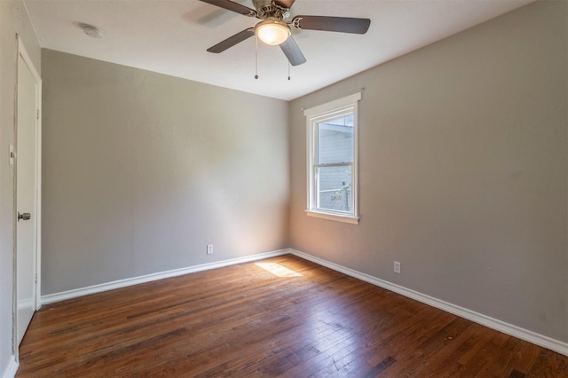 1610 Florence St, Arlington, TX 76010 - spare room featuring wood finished floors, baseboards, a smoke detector, and a ceiling fan