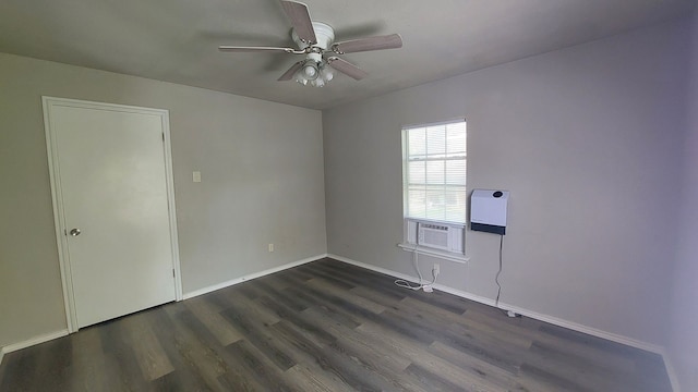 1107 Beech S, Bonham, TX 75418 - empty room with ceiling fan, dark wood finished floors, baseboards, and cooling unit