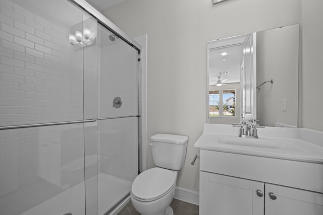 11549 Wulstone Rd, Fort Worth, TX 76052 - bathroom featuring toilet, a stall shower, vanity, and baseboards