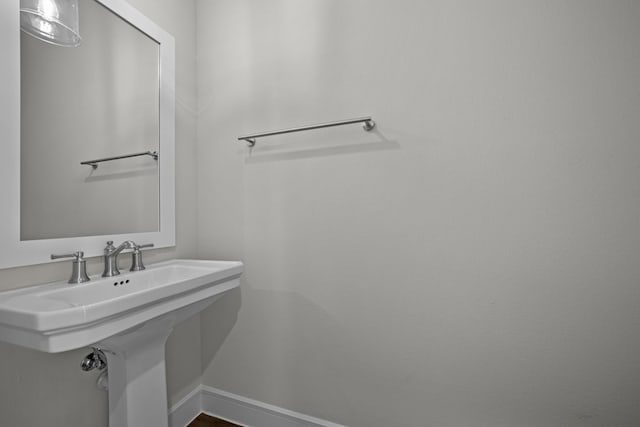 11549 Wulstone Rd, Fort Worth, TX 76052 - bathroom with baseboards and a sink