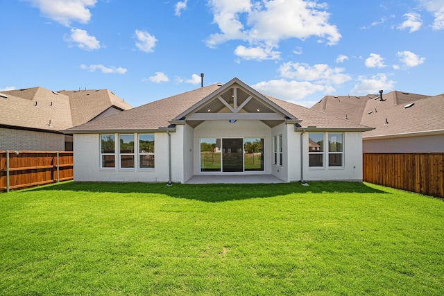 11549 Wulstone Rd, Fort Worth, TX 76052 - back of property featuring a patio area, brick siding, and a shingled roof