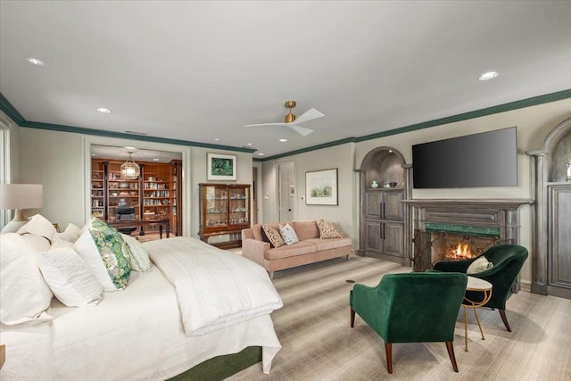 201 Jenkins Rdg, Aledo, TX 76008 - bedroom featuring crown molding, a lit fireplace, recessed lighting, and ceiling fan