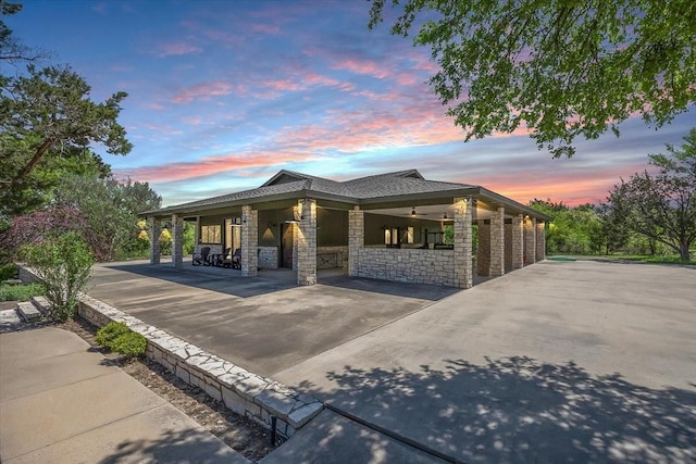 201 Jenkins Rdg, Aledo, TX 76008 - property exterior at dusk with stone siding and covered porch