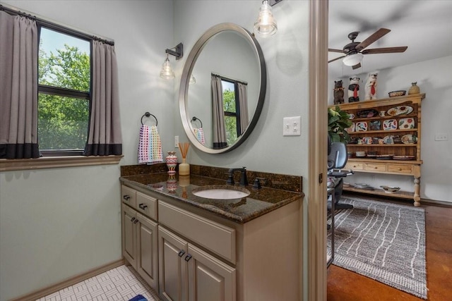 201 Jenkins Rdg, Aledo, TX 76008 - bathroom featuring vanity, a ceiling fan, and baseboards