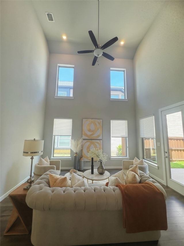 1002 Kennedy Dr, Allen, TX 75013 - living area with a high ceiling, wood finished floors, ceiling fan, baseboards, and recessed lighting